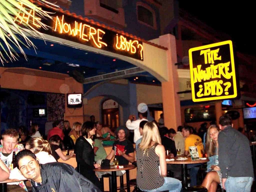 The Nowhere Bar's neon sign and arch on the marina, early 2000s
